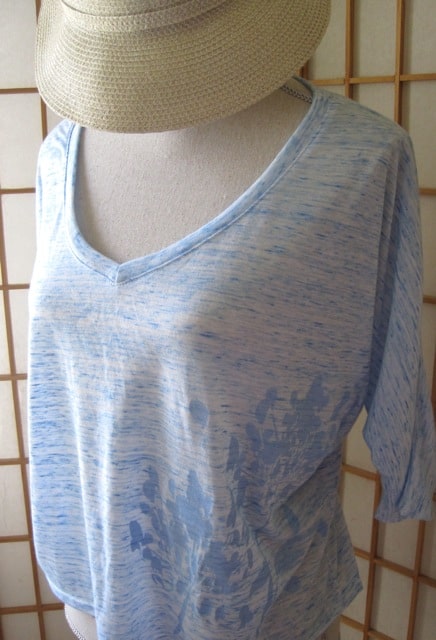 light blue crop top with agapanthus art